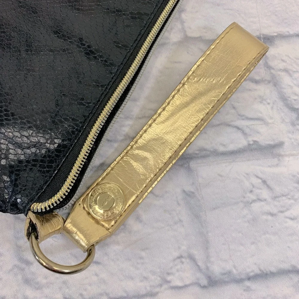 Betsey Johnson Betseyville Wristlet Black gold Ruffle Lightening